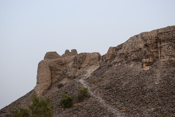 Fototapeta na wymiar A historical place in Mir e Kalat near Turbat Kech with view of beautiful mountain, dates tree summer season Balochistan Pakistan photo