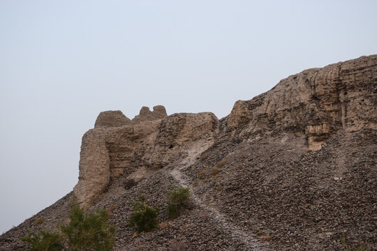 A historical place in Mir e Kalat near Turbat Kech with view of beautiful mountain, dates tree summer season Balochistan Pakistan photo