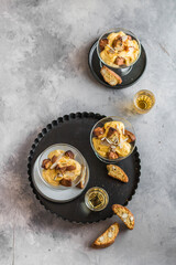 Tiramisù with cantucci cookies and vinsanto (ph. Tiziana Molti)
