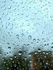 raindrops on glass natural pattern isolated on city background
