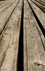 Surface of an old weathered wooden pier