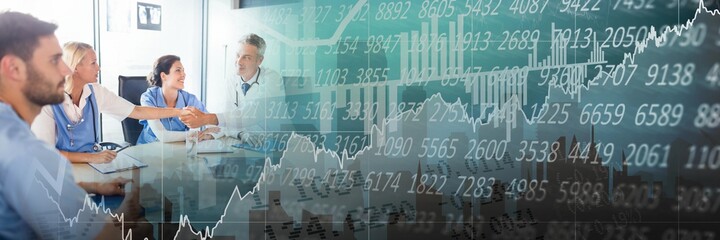 Composition of financial data processing over businessman handshake in background