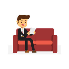 sitting on sofa in living room with tablet relax