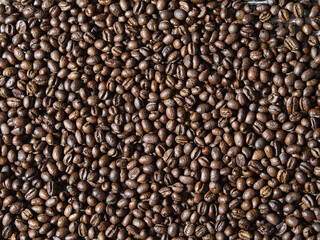 Full frame of aromatic roasted coffee beans background