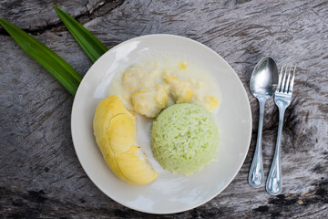 Thai sweet sticky rice with Durian.dessert popular in Thailand.Sticky rice made from pandan leaves