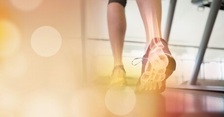 Composition of woman running on treadmill with leg bones visible and spots of light
