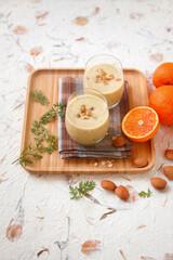 Smoothie with blood orange carrot leaves oats and ginger almonds (ph. Marianna Franchi)