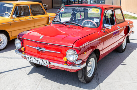 Soviet retro automobile ZAZ-968 parked up at the city street
