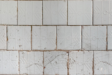 Soviet old dirty tile wall