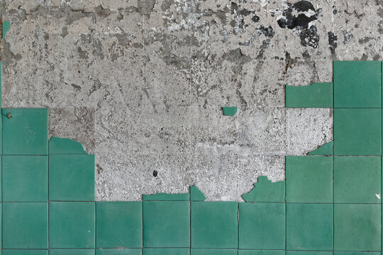 Soviet old dirty cracked tile wall