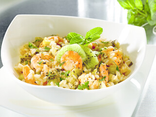 Risotto with prawns and kiwi fruits (ph. Archivio Collection)
