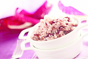 Creamy risotto with radicchio salad (ph. Archivio Collection)