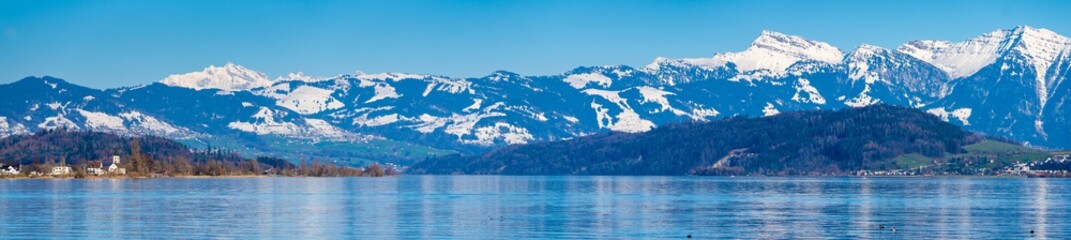 Stunning alpine landscapes along the shores of the Upper Zurich Lake with the iconic Santis peak in the background, Rapperswil-Jona, St. Gallen, Switzerland