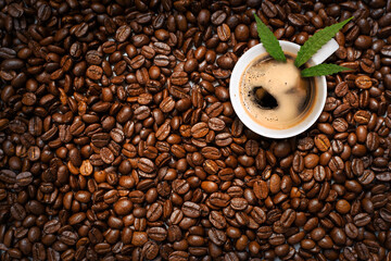 hot coffee with cannabis leaf on the table