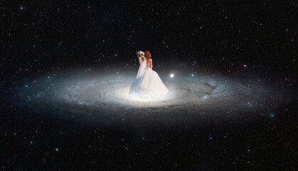 Fototapeta na wymiar Bride standing on Andromeda Spiral Galaxy