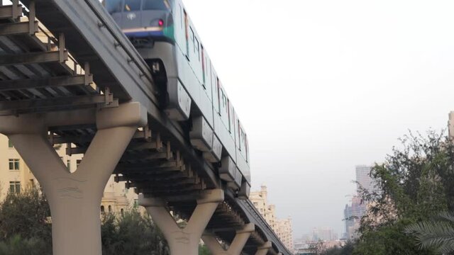 Dubai, UAE - 05.15.2021 - Footage of a monorail in Palm Jumeirah island. Urban