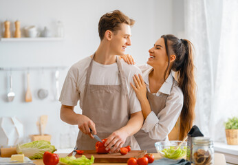 loving couple is preparing the proper meal