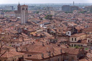Obraz premium View of the tiled roofs of ancient houses in the center of Brescia (Lombardy, Italy)