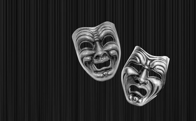Black and White Photo - Comedy and Tragedy theatrical venetian mask with red theater curtain