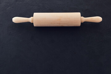 Close up Rolling Pin on Cooking Stone Table