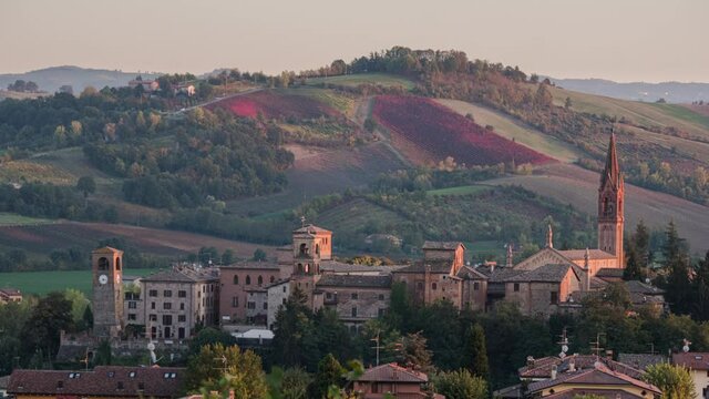 Sunset time lapse of the old town of Castelvetro and vineyards with autumn colors, Modena, Emilia Romagna, Italy, Europe