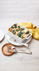 Lasagna with salmon and spinach (ph. Marianna Franchi)