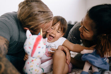 A happy international family at home