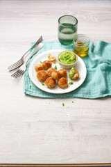 Cereal meatballs with fava beans and seeds cream (ph. Marianna Franchi)