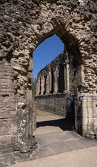 Doorway leading into the refectory from the cloister at Tintern Abbey, Monmouthshire, Wales, UK