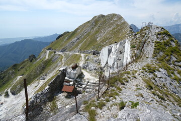 White marble quarries on Monte Corchia.Apuan Alps in Alta Versilia. On the mountain peaks, near Carrara, white marble is quarried. Alpi Apuane, Tuscany, Italy.