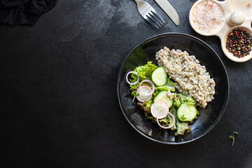 green buckwheat salad vegetables lettuce mix meal snack copy space food background rustic. top view diet vegan or vegetarian food