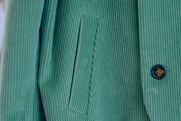 Closeup of green handmade coat