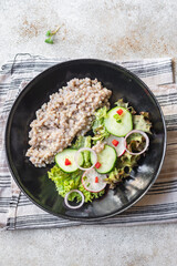 green buckwheat salad vegetables lettuce mix meal snack copy space food background rustic. top view diet vegan or vegetarian food