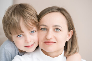 Portrait of mom with her son close up        