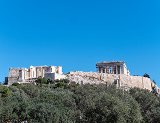Naklejka premium Parthenon on Acropolis of Athens Greece, under clear blue sky, space for your text