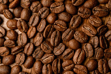 perfect top view of dark roasted coffee beans.