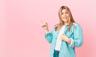 curvy pretty blonde woman looking arrogant, successful, positive and proud