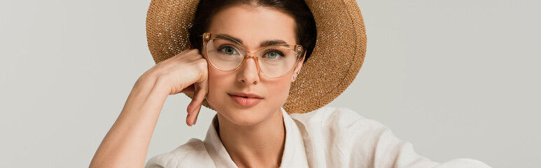 young woman in straw hat and glasses isolated on white, banner