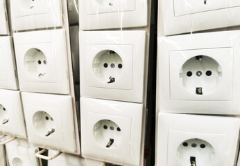 Store socket and switch display of productrs on sale on wall demonstration models for customers