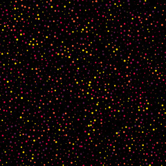 Gold glitter texture on a black background. Golden explosion of confetti.