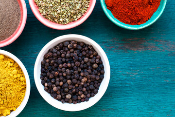 Colourful various vegatable and spices for cooking on blue background