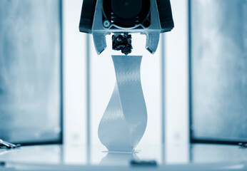 3D printer working close up. Automatic three dimensional 3d printer