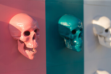 Multi colored skulls on wall
