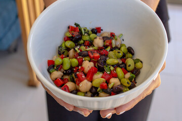 Closeup shot of different cereals salad on the white plate