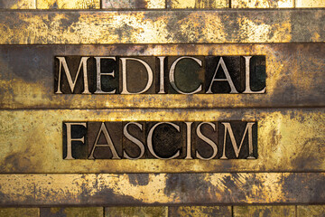 Medical Fascism text on vintage textured grunge copper and gold steampunk background