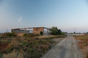 Abandoned Building in clean sky background cover located in Thailand