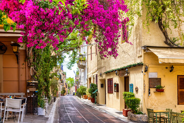 Beautiful view to the little streets of the old town Plaka of Athens, Greece with colorful houses...