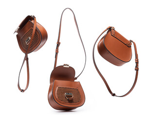Brown leather ladies bag flying on white background. Handmade  leather bag