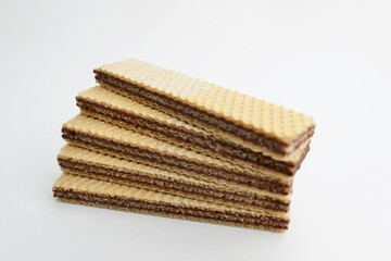 Wafers stick isolated on white background. Wafers biscuit. Pile of rectangle shaped wafer biscuits...