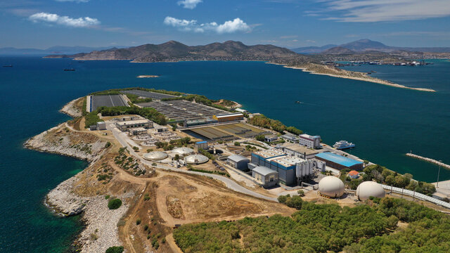 Aerial drone photo of latest technology sewage and sludge processing plant in small island of Psitalia or Psyttaleia, Piraeus, Attica, Greece